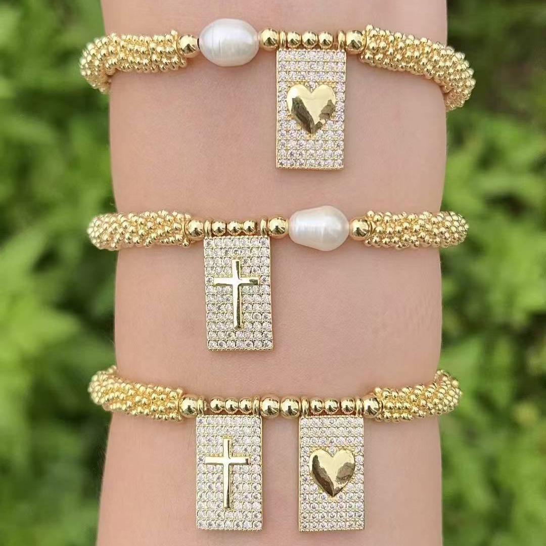 Elegant Pearl Cross Bracelet
