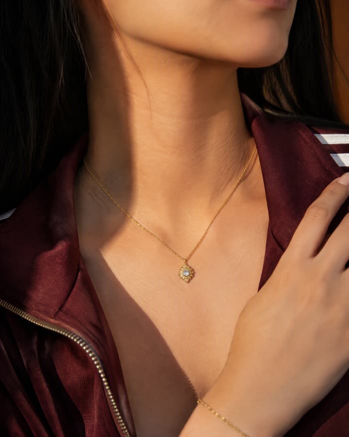 Dainty Flower Stone Pendant Necklace — worn