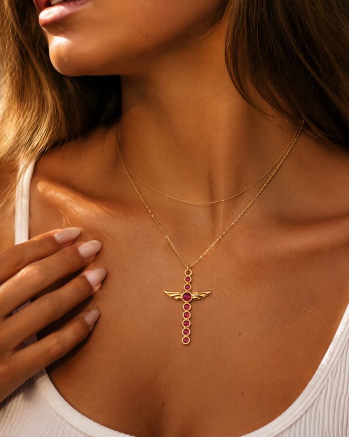 Winged Cross Pendant Necklace — worn